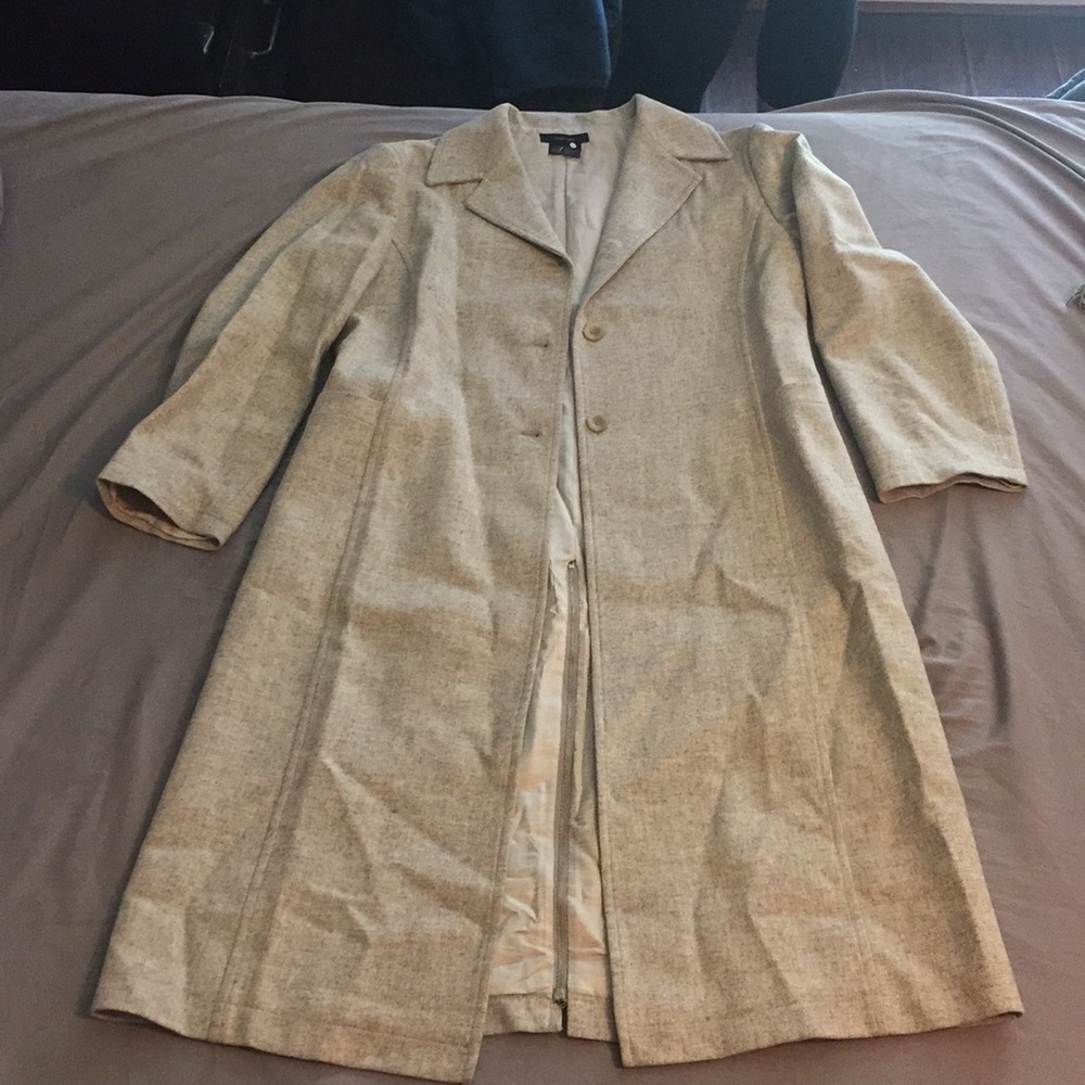 Midi length coat.